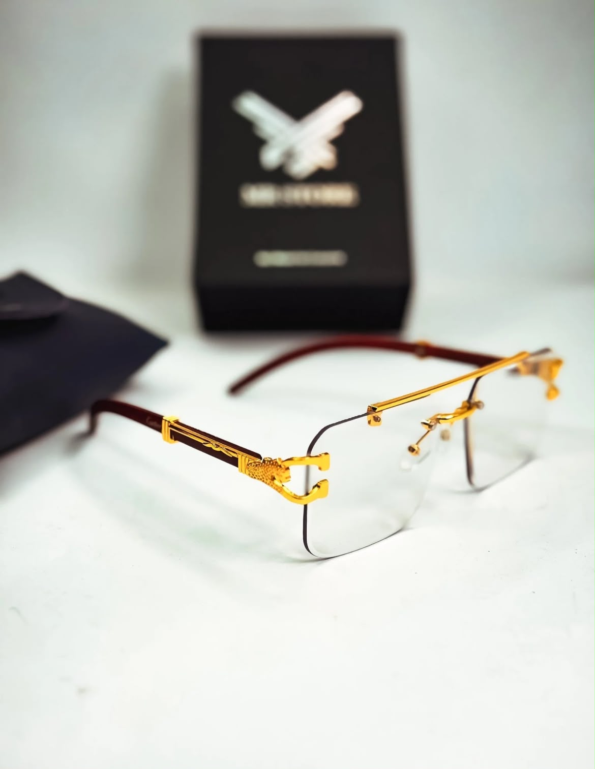Luxury Rimless Gold Eyewear - Wood Temples & Panther Motif